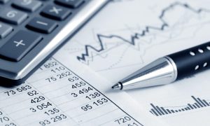financial planning figures and pen