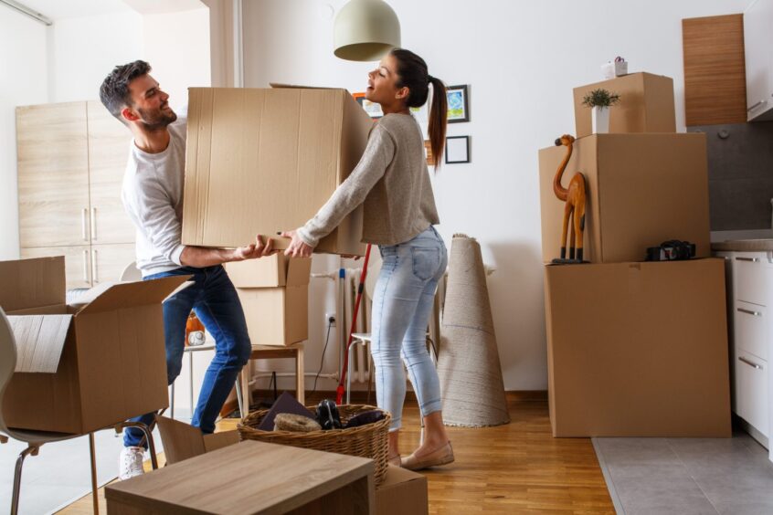 Young couple moving house.