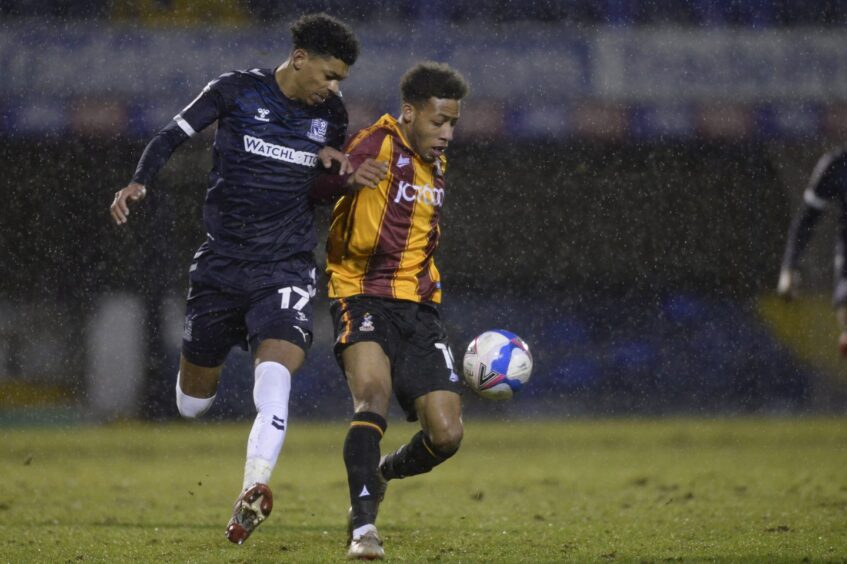 Rumarn Burrel, right, in action during his loan spell with Bradford City.