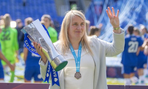 Chelsea manager Emma Hayes lifts the WSL trophy.