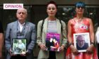 Members of Covid-19 Bereaved Families for Justice UK and Northern Ireland. From left to right, Larry Byrne, Martina Ferguson and Sioux Vosper, outside the Covid-19 Inquiry in London. Image: Andy Rain/EPA-EFE/Shutterstock
