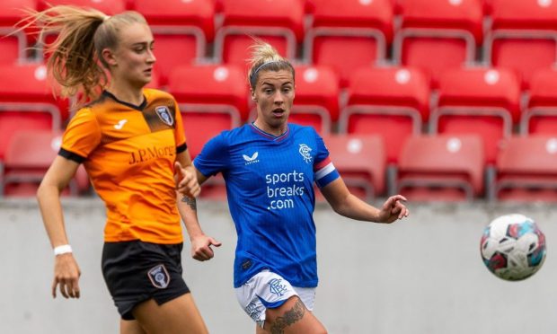 Glasgow City's Lauren Davidson battles with Nicola Docherty of Rangers.