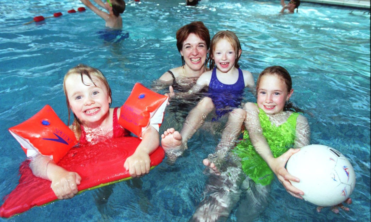 A mother and three little girls making memories in the swimming pool at Dyce Marriott