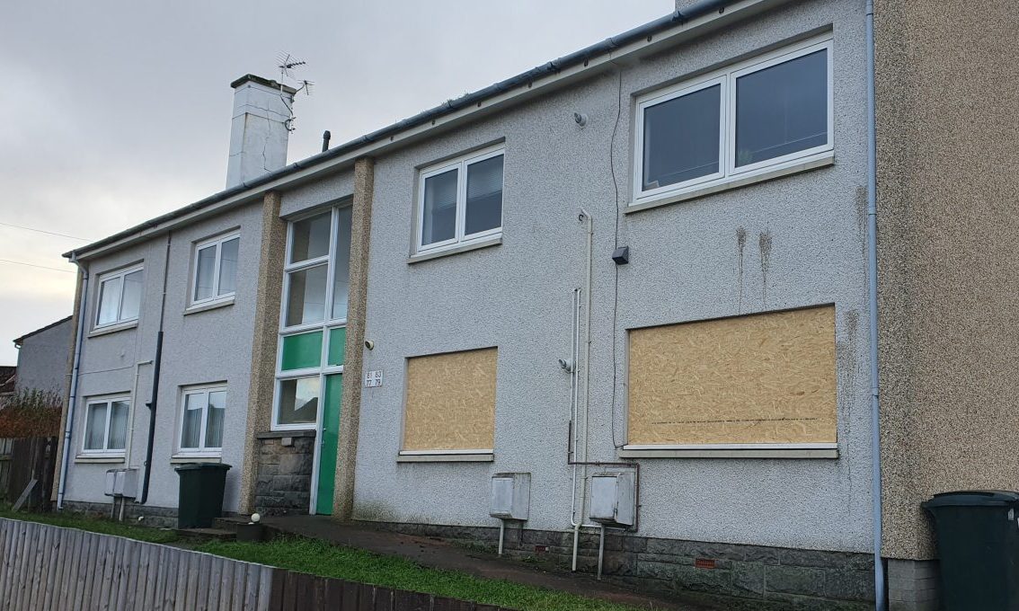 Windows boarded up at Kiesha Donaghy's flat. 