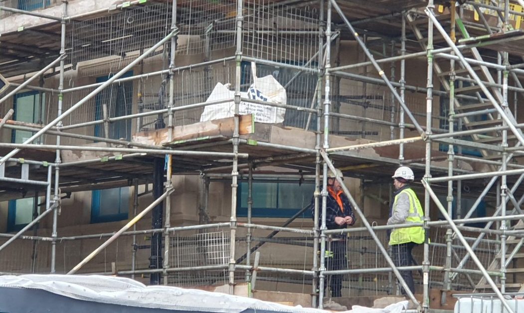 Close-up of Poundland building through scaffolding. 