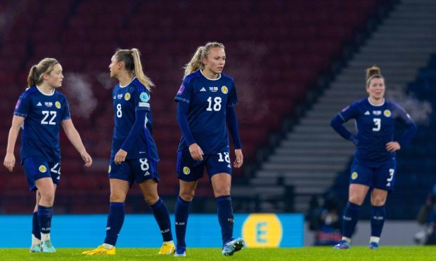 Scotland players looked dejected as England inflict heavy defeat in Nations League match.