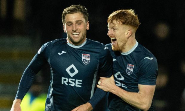 Ross County goalscorers Ben Purrington and Simon Murray during the victory against Motherwell. Image: SNS