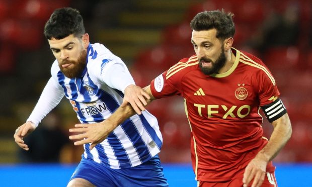 Aberdeen's Graeme Shinnie and Kilmarnock's Liam Donnelly in action in Killie's 1-0 win at Pittodrie in December.