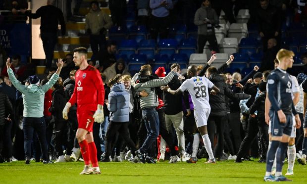 Dundee supporters' pitch invasion after the Ross County game