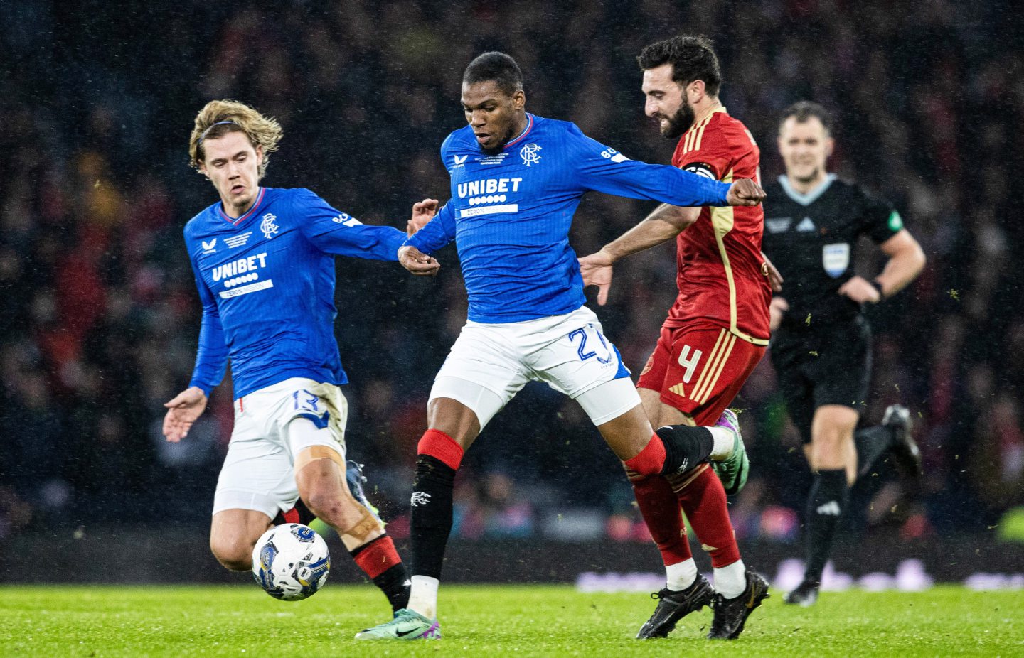 Rangers' Todd Cantwell (L) and Dujon Sterling and Aberdeen's Graeme Shinnie in action during the Viaplay Cup Final at Hampden Park. Image: SNS 