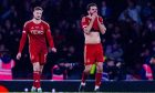 Aberdeen's Graeme Shinnie and Rochard Jensen look dejected as Rangers' James Tavernier scores to make it 1-0 in the Viaplay Cup Final at Hampden. Image; SNS