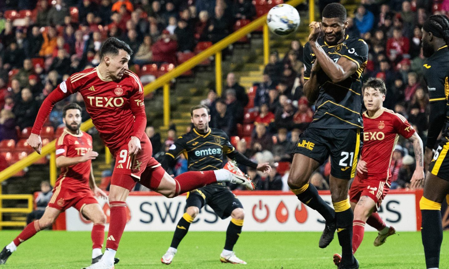 Miovski scoring to make it 1-1 against Livingston for the Dons