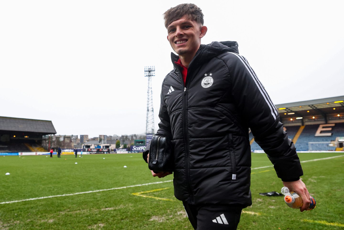 Aberdeen's Leighton Clarkson checks out the pitch after the game was postponed at Dundee. Image: SNS 