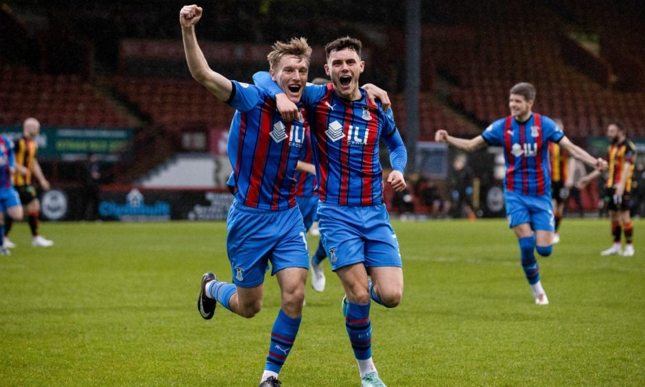 Caley Thistle's Max Anderson (left) celebrates with Cammy Harper after opening the scoring at Firhill.