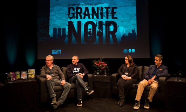 Granite Noir in a previous year with four speakers for a Q&A on stage in Aberdeen.