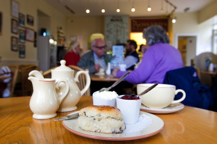 A scone and tea at Bossards Patisserie.