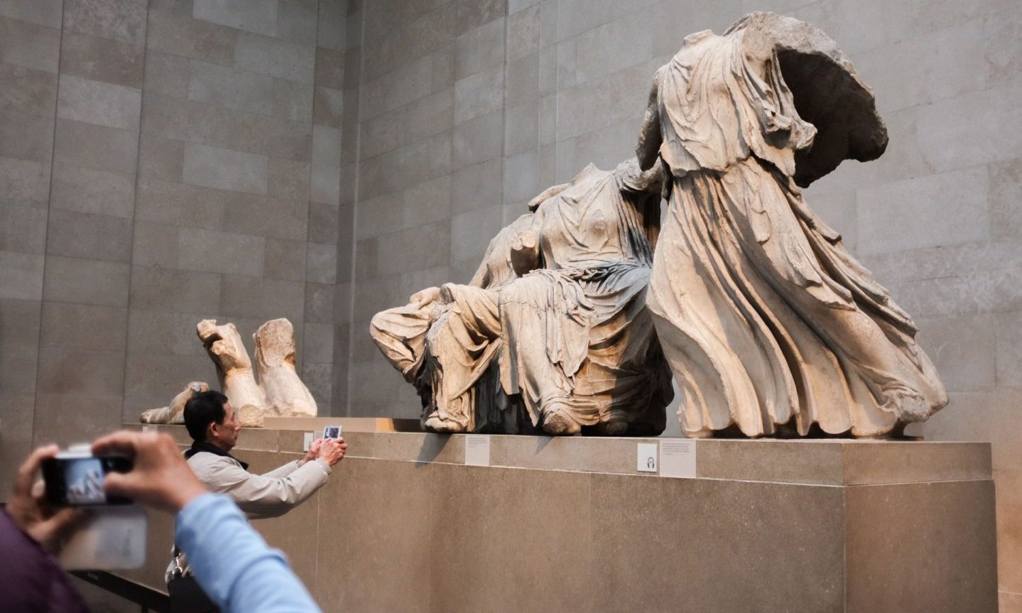 Elgin Marbles being photographed by tourists at British Museum. 