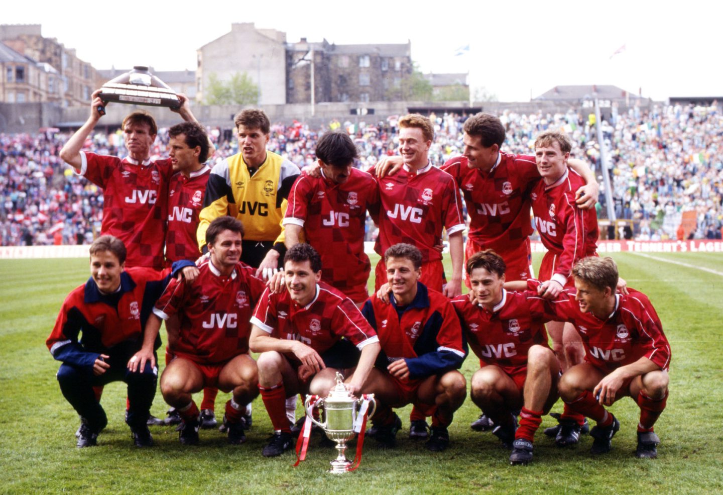The Aberdeen players celebrate winning the Scottish Cup in 1990 to complete the double that seaaon.Back row from left: Alex McLeish, Hans Gillhaus, Theo Snelders, Robert Connor, Gregg Watson, Brian Irvine, Stuart McKimmie. Front row from left: Eoin Jess, Charlie Nicholas, Jim Bett, Paul Mason, David Robertson and Brian Grant. Image: SNS 