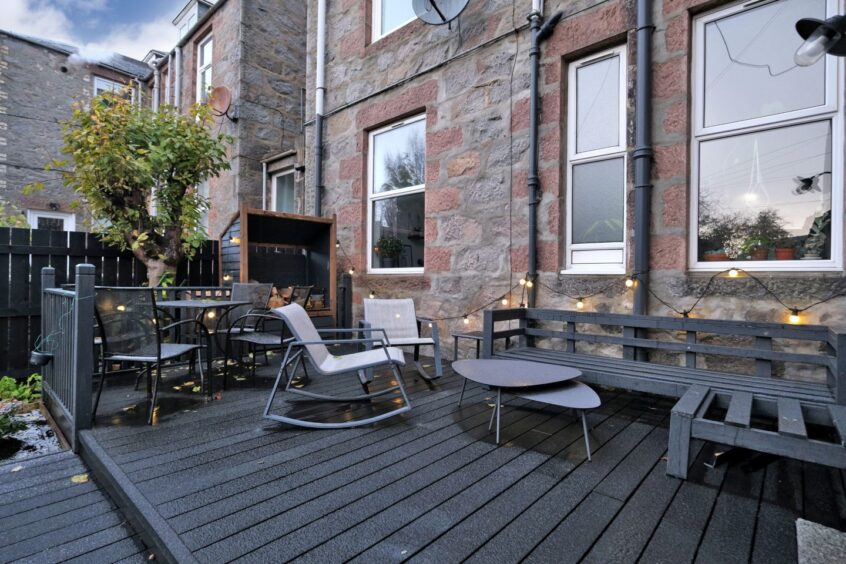 The patio furnature in the garden of the home in Aberdeen after the renovation.