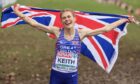 Great Britain's Megan Keith celebrates after crossing the finish line to take first place in the Women's Under 23 race during the European Cross Country Championships in Brussels. Image: PA
