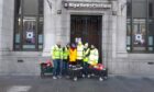 Royal Bank of Scotland volunteers outside their branch.