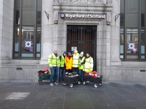 Royal Bank of Scotland volunteers outside their branch.