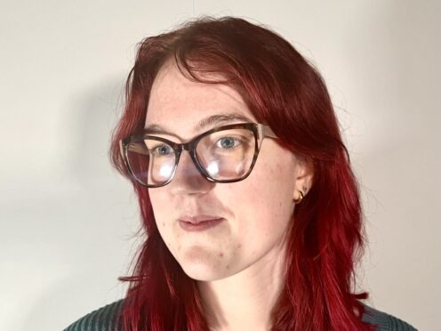 headshot of woman modeling frames from Duncan and Todd opticians sale