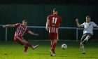 Marc Lawrence, left, scores for Formartine United against Brechin City. Pictures by Jasperimage