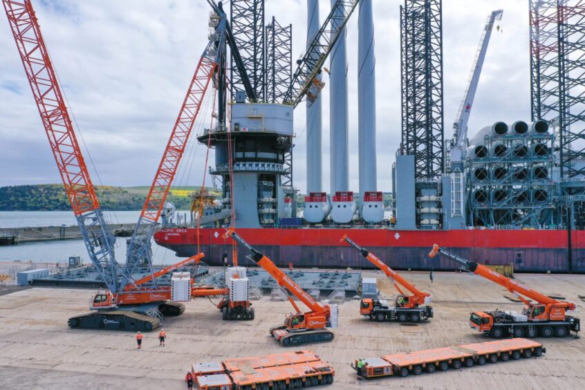 Moray East offshore wind farm cranes and logistics at Port of Nigg. 