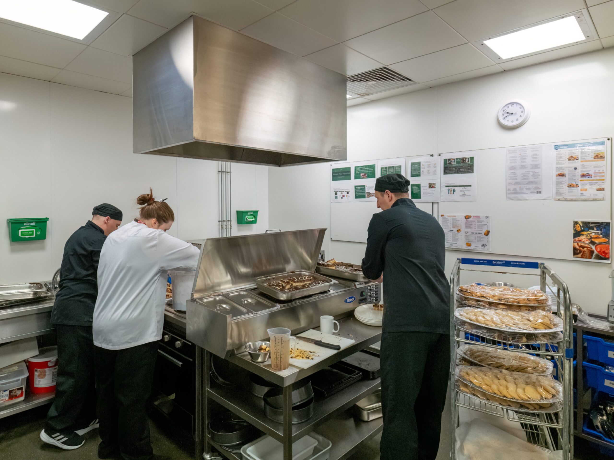 HMP Grampian prisoners working in a kitchen through the Greene King Training Academy job scheme
