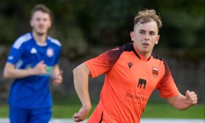 16 September 2023. Rothes FC, Mackessack Park, Station Street, Rothes, AB38 7BX. This is from the Breedon Highland League Match between Rothes FC and Lossiemouth FC. PICTURE CONTENT:- Rothes - Fraser Robertson.                    CREDIT:- JASPERIMAGE