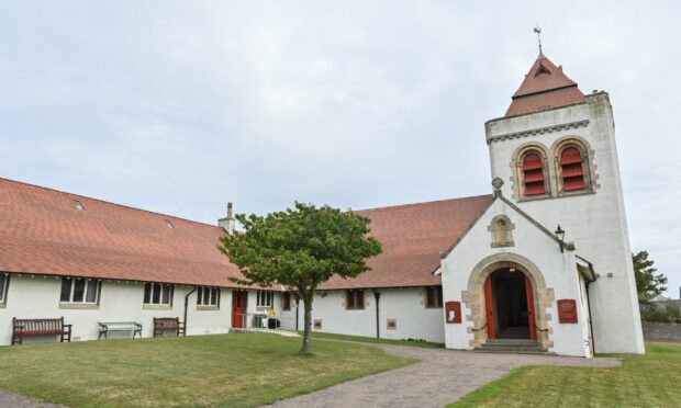 View across grounds to St Gerardine's Church in Lossiemouth.