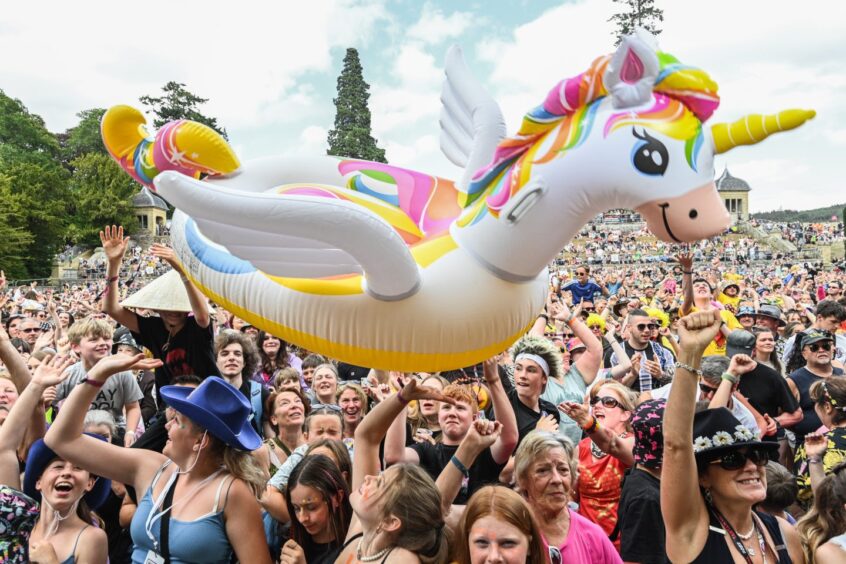 An inflatable unicorn goes for a surf. Supplied by Paul Campbell.