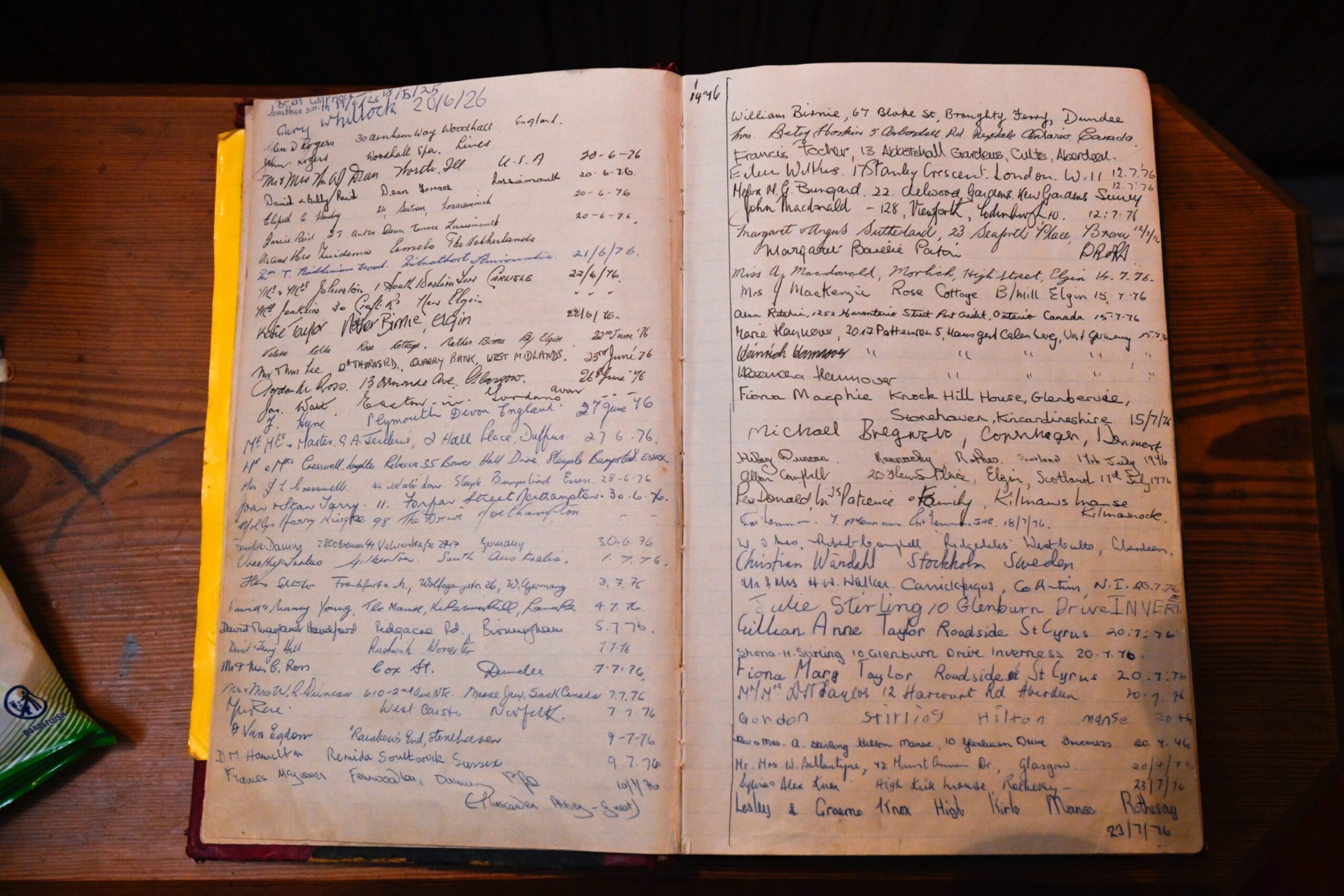 Pages of Birnie Kirk guestbook lying open. 