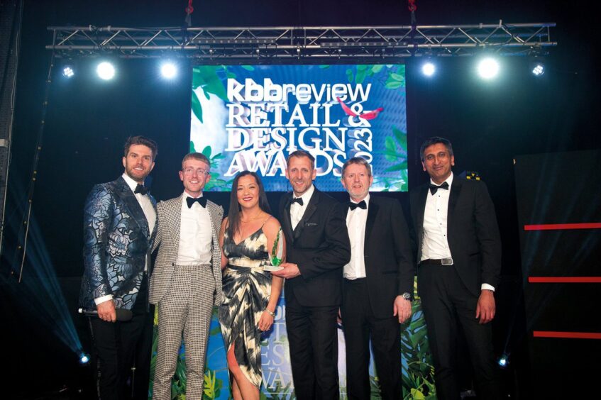 Ian Charles, second from the right, with other members of Laings' winning team at the kbbreview Retail and Design Awards in Cardiff. 