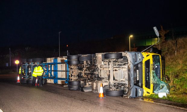 Police Scotland at the scene of an RTC of an Overturned lorry in Stonehaven.