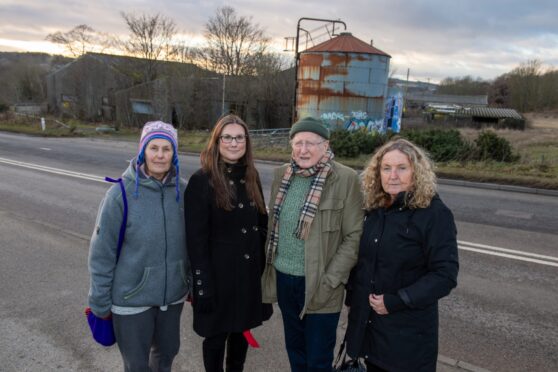 Danestone Community Council members Laura Davison, Sarah-Jane Foxen, Joe McWilliam and Kathryn Duncan next to the proposed battery storage facility site. Image: Kenny Elrick/DC Thomson