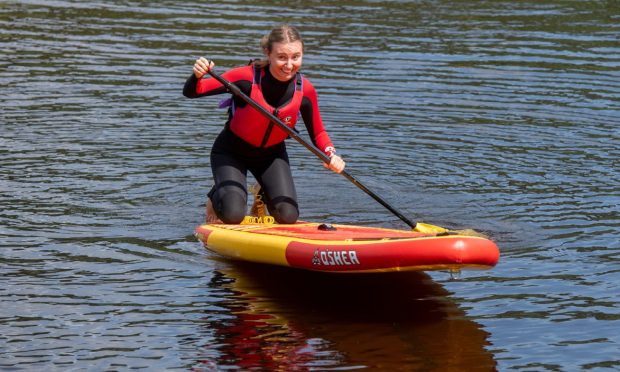 P&J reporter Shanay Taylor on a paddle board on Knockburn Loch