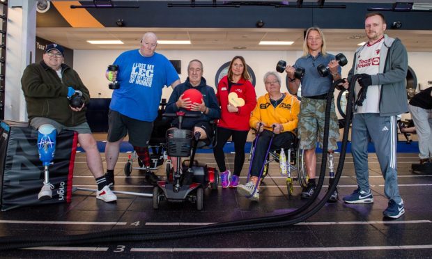 A group photo of the amputees at the Aberdeen gym. The ASV amputees in action. From left, Atholl Smart, Ian Aiken, Gordon Buchan, Tracy Stainer, Bernie van der Heijdt, Derek Stephen and Kenny Shewan.