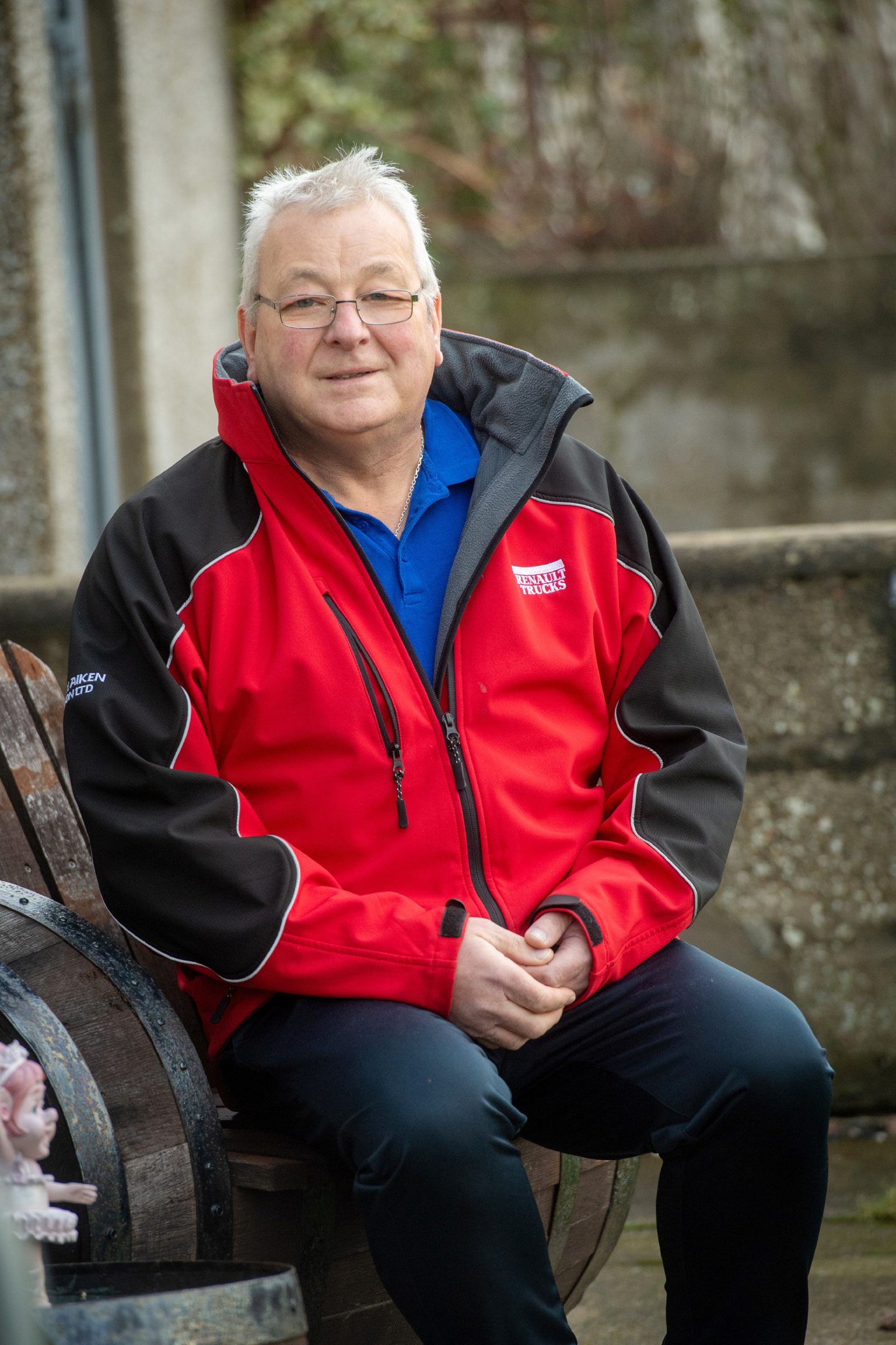 A portrait photo of Tommy sitting on his own in Fraserburgh.