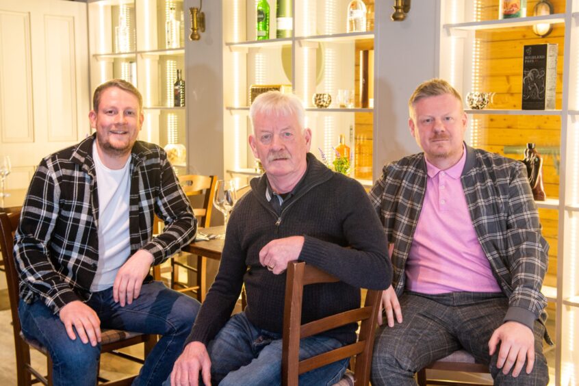 Ryan Clark, right, with brother Darren and father Brian at The Atrium in Chapel Street. The family run a number of north-east venues. Image: Kami Thomson/DC Thomson