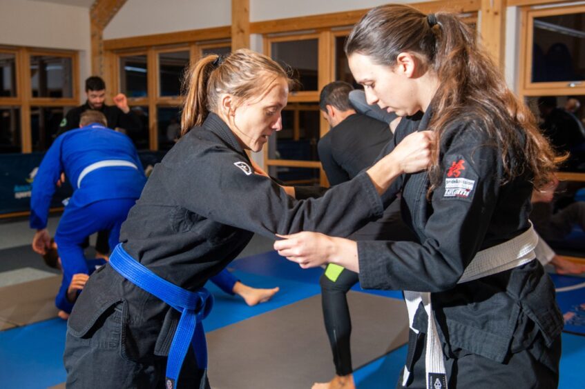 P&J reporter Lottie Hood practicing Jiu Jitsu with an instructor