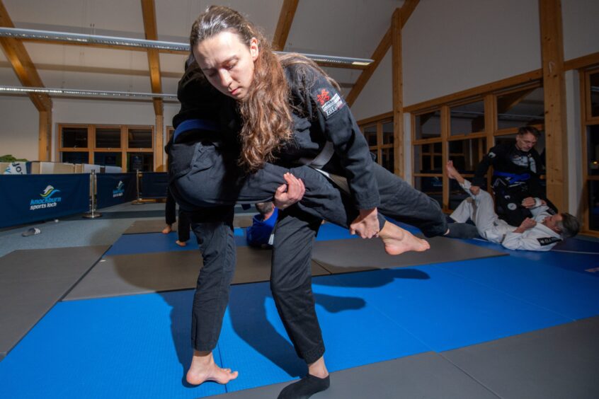 Lottie and Beata trying the a wrestling takedown from a single leg