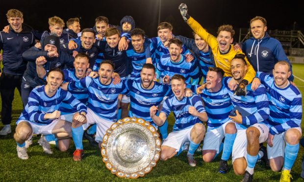 Banks o' Dee celebrate with the Aberdeenshire Shield. Image: Kami Thomson/DC Thomson