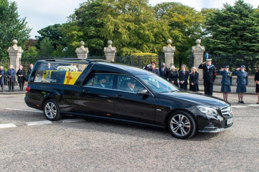 David Cameron's lord-lieutenant uniform arrived the day before he saluted the Queen's coffin as it passed through Aberdeen in September 2022. Image: Norman Adams/Aberdeen City Council