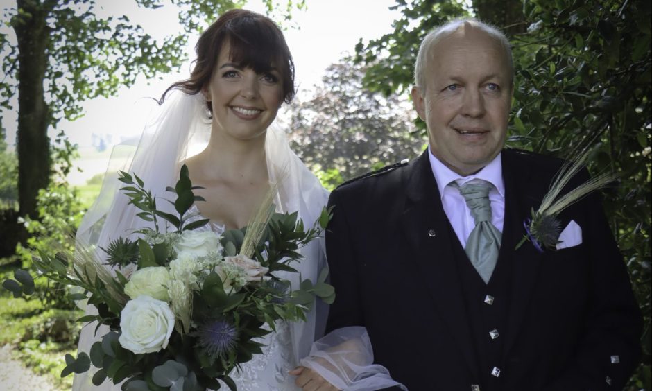 Louise with her dad David Cruickshank on her wedding day.