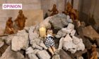 A nativity installation of the baby Jesus laying in ruins, symbolising children killed in Gaza, displayed in the Evangelical Lutheran Christmas Church in Bethlehem, West Bank. Bethlehem, West Bank. Image: Debbie Hill/UPI/Shutterstock