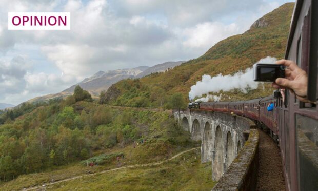 The Jacobite Steam Train making its way along the Glenfinnan Viaduct on the West Highland Line. Image: Yui Mok/PA Wire