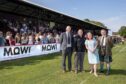 Derek Keir (Camanachd Association CEO); Ian Roberts (Mowi Director of Communications); Maree Todd (Minister for Social Care, Mental Wellbeing and Sport) and Steven MacKenzie (Camanachd Association President) at the 2023 cottages.com MacTavish Cup Final. Image: Neil Paterson