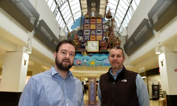 Eastgate Centre manager Chris Kershaw (left) with operations manager Rod Callender at the famous clock.
Image Sandy McCook/DC Thomson